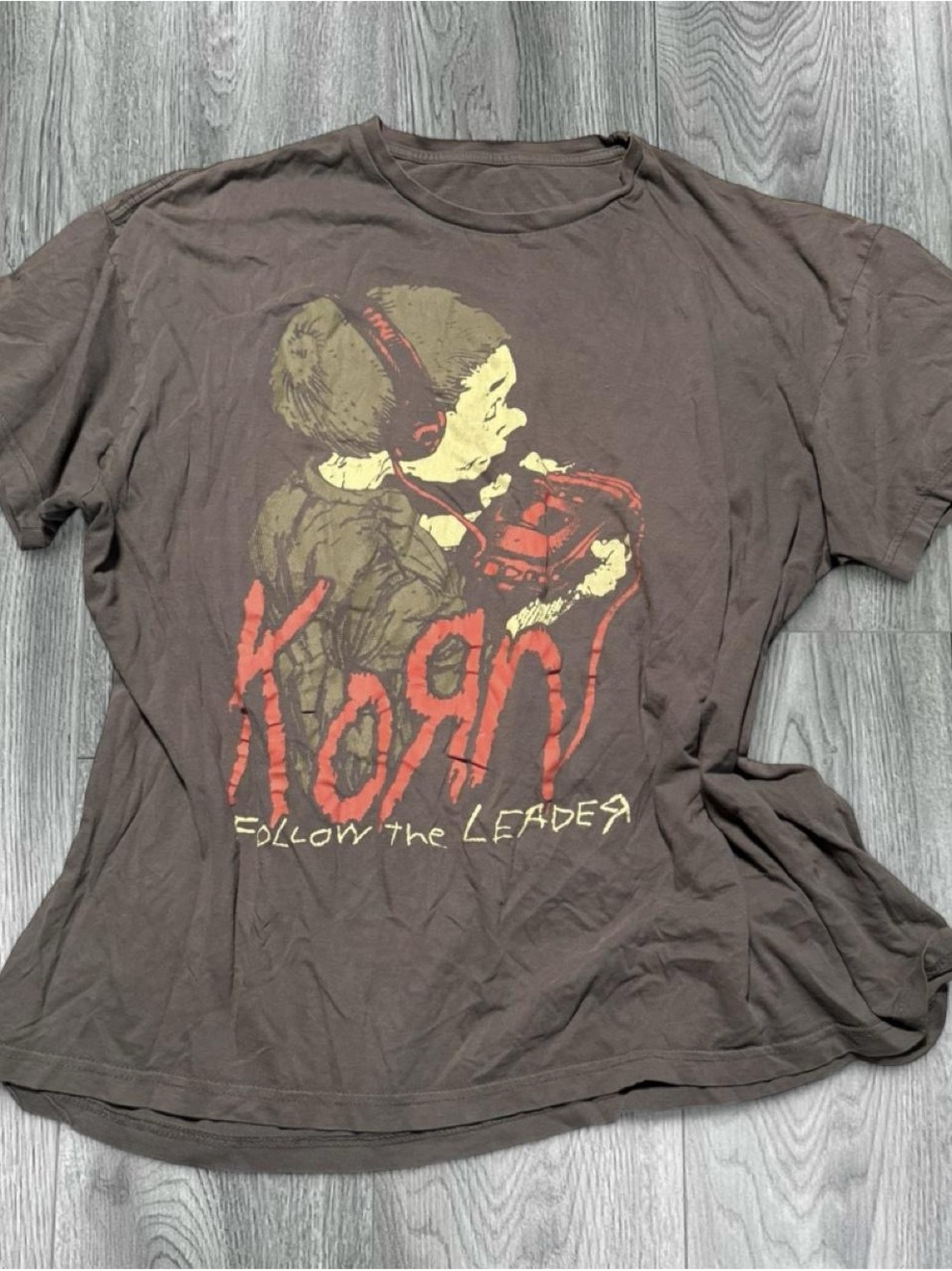 Spencer's Korn 'Follow the Leader' Brown Band Tee with Red and Yellow Graphic